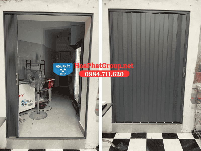 Lắp cửa xếp lá nhôm hòa phát tại vị trí lối ra vào khu vực bếp cửa hàng Lắp cửa xếp lá nhôm hòa phát tại vị trí lối ra vào khu vực bếp cửa hàng