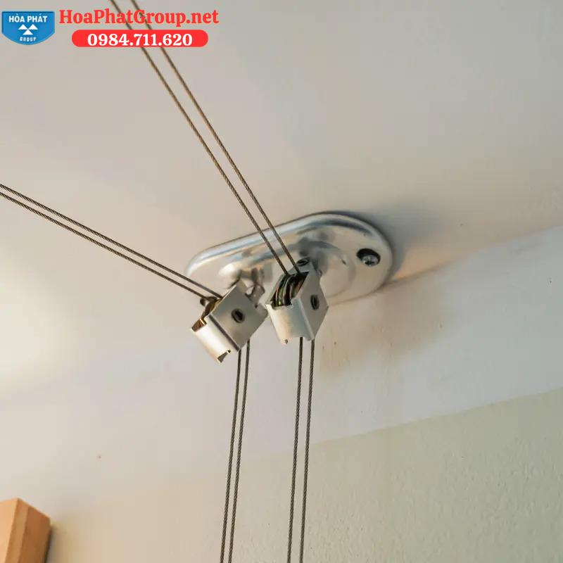 dẫn hướng giàn phơi điều hướng dây cáp chạy về bộ ổ quay